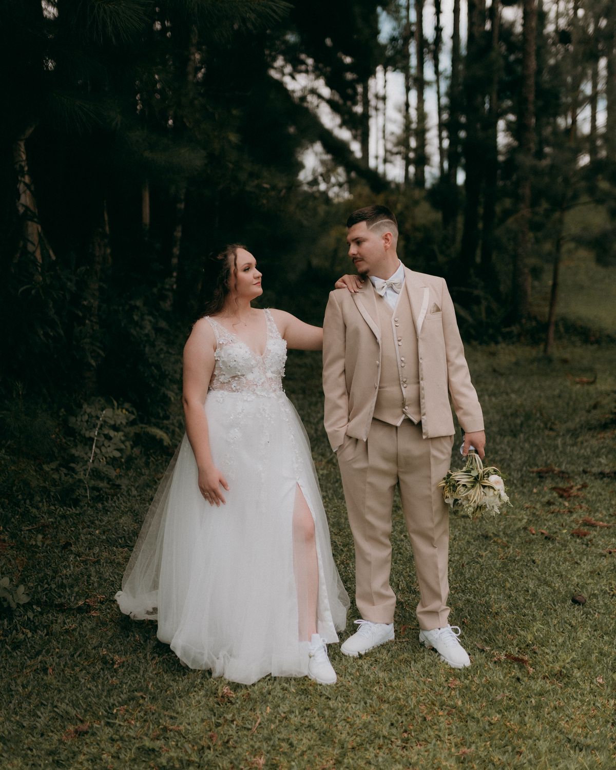Bride and groom portrait taken outdoors in natural light